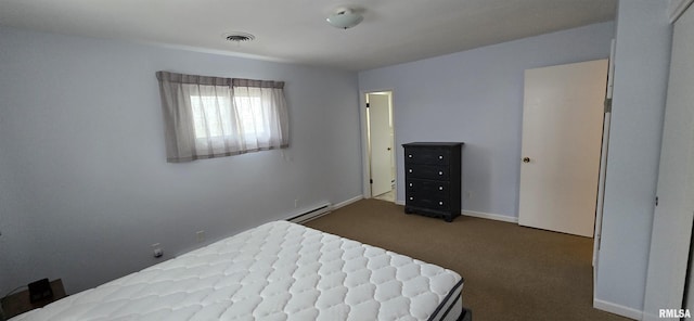 308 Blossom St, Carterville, IL 62918 - bedroom featuring a baseboard radiator and dark carpet