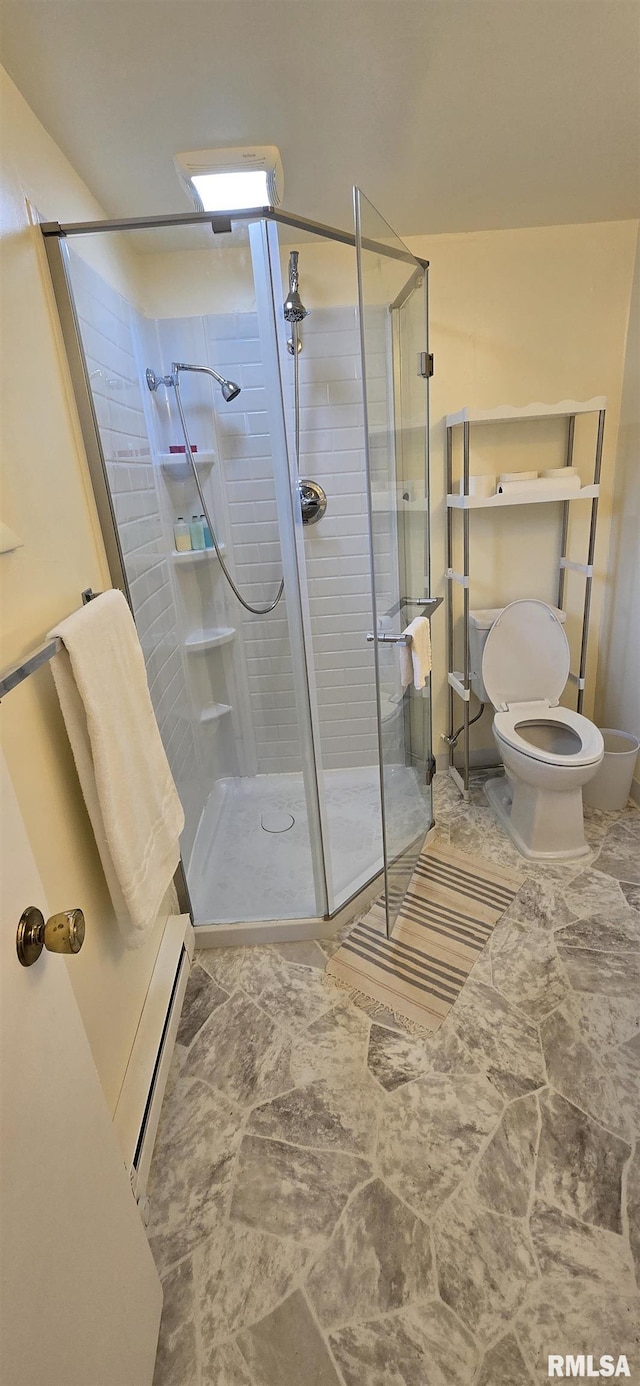 308 Blossom St, Carterville, IL 62918 - full bath featuring a baseboard heating unit and a stall shower