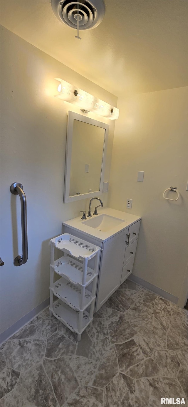 308 Blossom St, Carterville, IL 62918 - bathroom featuring vanity and baseboards