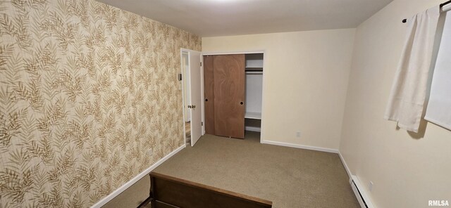 308 Blossom St, Carterville, IL 62918 - unfurnished room with wallpapered walls, baseboard heating, and carpet floors