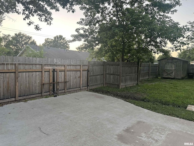 308 Blossom St, Carterville, IL 62918 - fenced backyard with a patio area and a shed