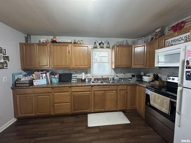 525 N St, Murphysboro, IL 62966 - kitchen with white appliances, dark wood-type flooring, dark countertops, and decorative backsplash