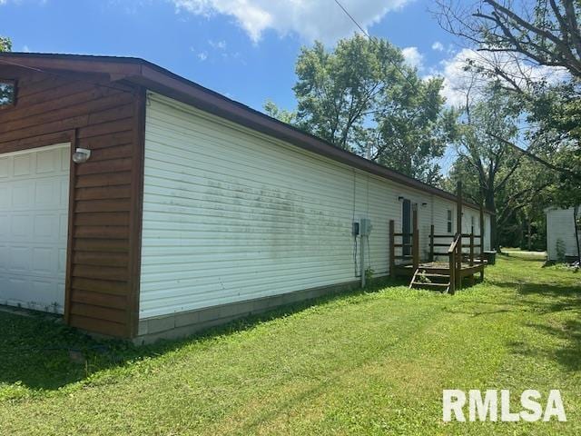 1011 S 20th St, Murphysboro, IL 62966 - view of side of property featuring a yard and a garage