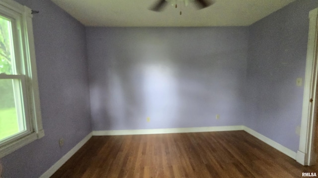 711 Mclean St, Rosiclare, IL 62982 - spare room with wood finished floors and ceiling fan