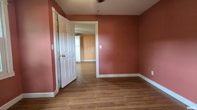711 Mclean St, Rosiclare, IL 62982 - empty room featuring wood finished floors