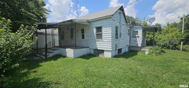4801 Quail Run Rd, Salem, IL 62881 - view of property exterior featuring a lawn