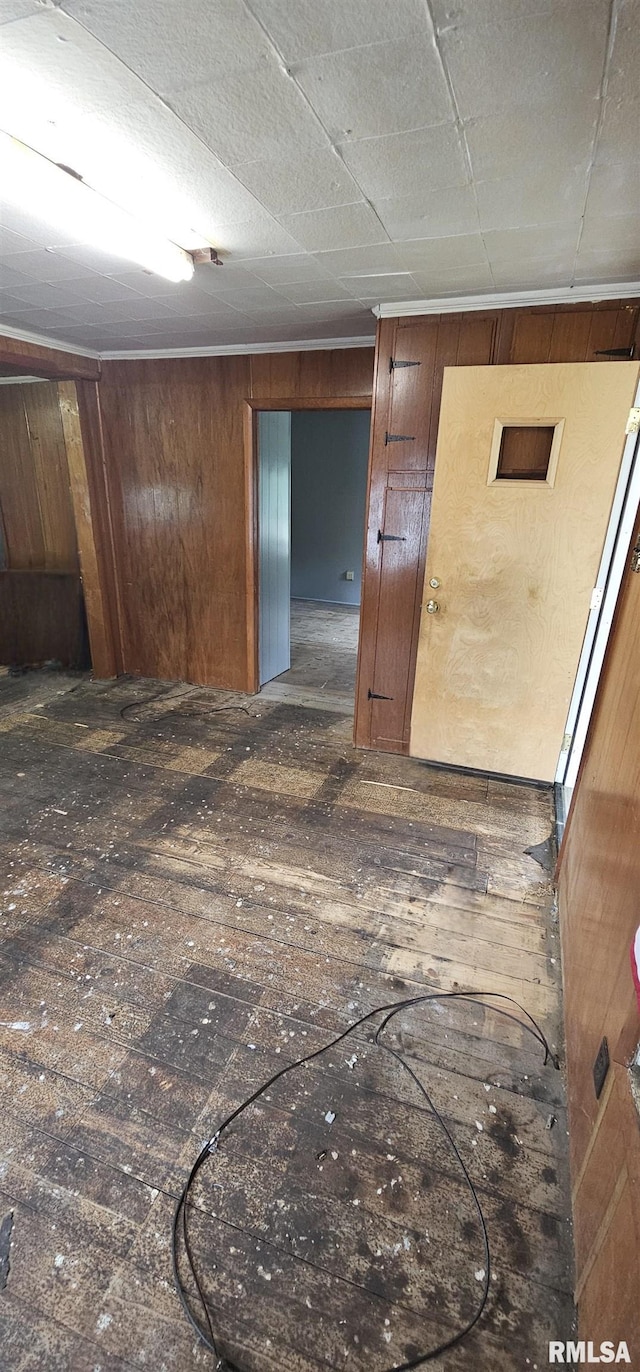 4801 Quail Run Rd, Salem, IL 62881 - spare room featuring hardwood / wood-style flooring and wood walls