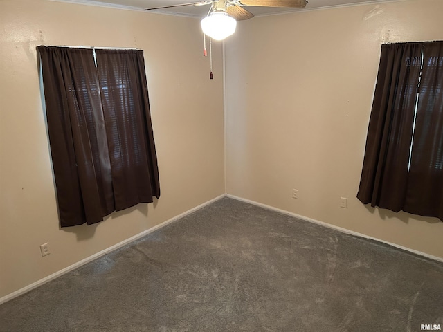 1026 E Noleman St, Centralia, IL 62801 - spare room featuring carpet flooring and a ceiling fan