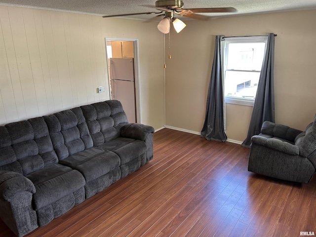 1026 E Noleman St, Centralia, IL 62801 - living room with ceiling fan, wood finished floors, and a textured ceiling
