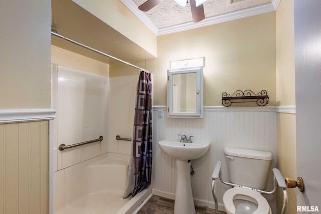 16777 Dublin St, West Frankfort, IL 62896 - full bathroom with wainscoting, ornamental molding, and ceiling fan