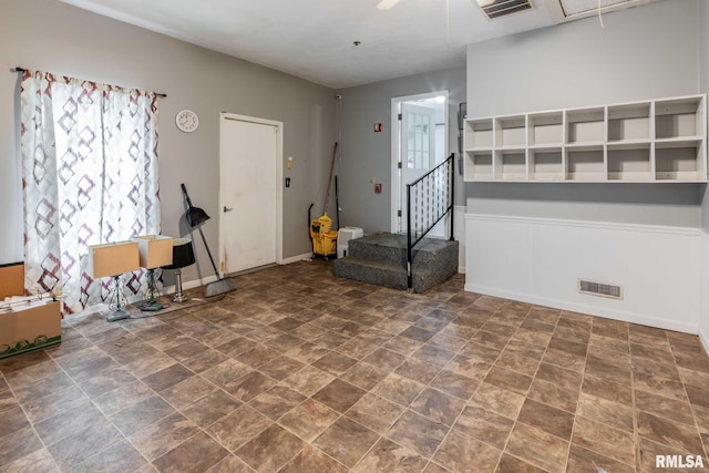 16777 Dublin St, West Frankfort, IL 62896 - spare room with stone finish flooring, attic access, and stairs