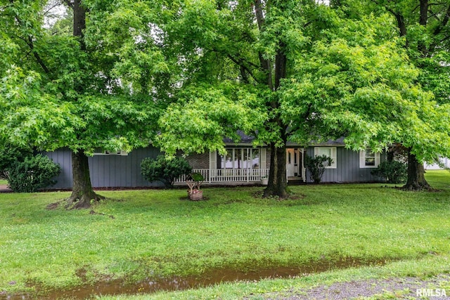 16777 Dublin St, West Frankfort, IL 62896 - view of grassy yard featuring a porch