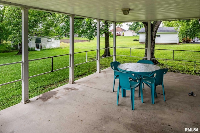 16777 Dublin St, West Frankfort, IL 62896 - view of patio / terrace with outdoor dining area and a storage unit