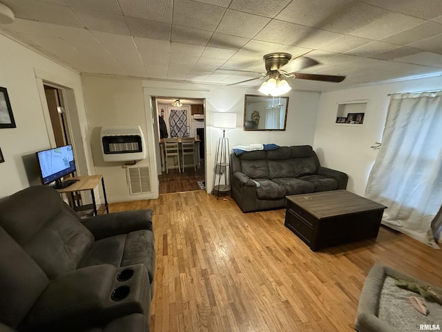 41 Cache Ave, Buncombe, IL 62912 - living room featuring heating unit, wood finished floors, and ceiling fan