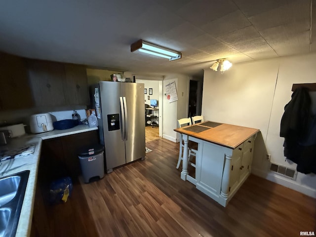 41 Cache Ave, Buncombe, IL 62912 - kitchen featuring stainless steel fridge with ice dispenser, dark wood-style floors, and light countertops