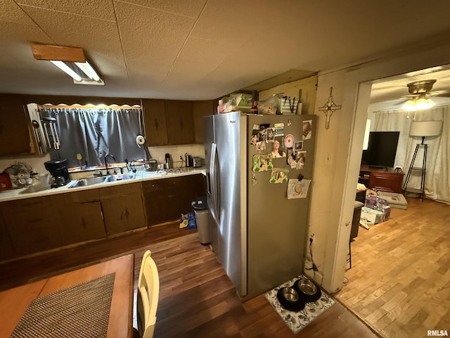 41 Cache Ave, Buncombe, IL 62912 - kitchen featuring stainless steel refrigerator with ice dispenser, light wood-type flooring, light countertops, and ceiling fan