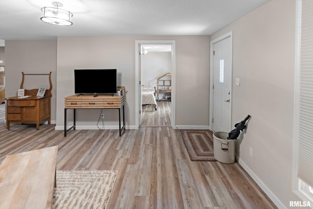 416 S Maple St, Salem, IL 62881 - living room featuring wood finished floors and baseboards