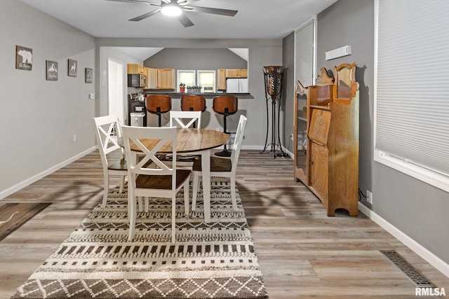 416 S Maple St, Salem, IL 62881 - dining room with a ceiling fan and light wood-type flooring