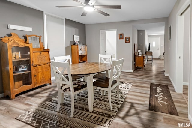 416 S Maple St, Salem, IL 62881 - dining area featuring wood finished floors and a ceiling fan