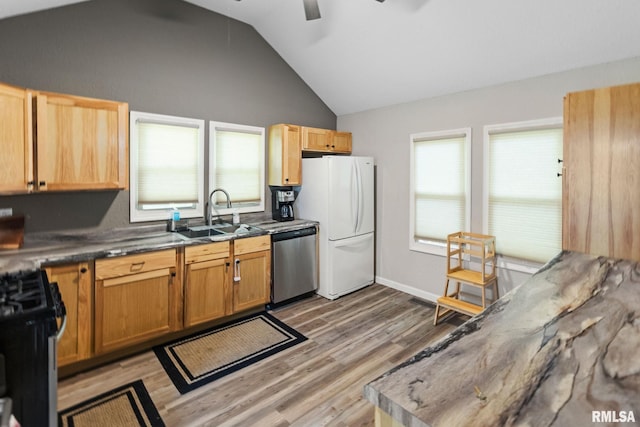 416 S Maple St, Salem, IL 62881 - kitchen featuring appliances with stainless steel finishes, ceiling fan, lofted ceiling, light wood finished floors, and dark countertops