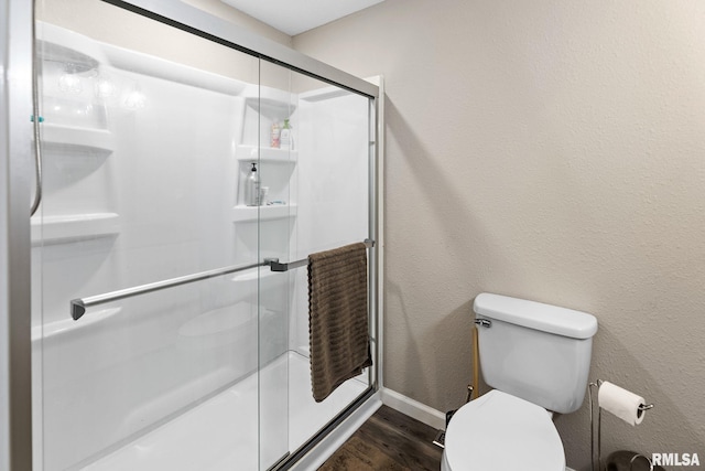 416 S Maple St, Salem, IL 62881 - full bathroom with wood finished floors, an enclosed shower, and a textured wall