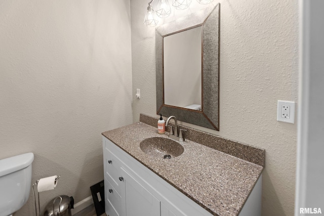 416 S Maple St, Salem, IL 62881 - half bath with vanity and a textured wall