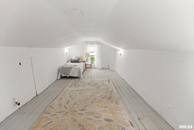 416 S Maple St, Salem, IL 62881 - bedroom featuring light wood finished floors and vaulted ceiling