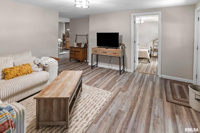 416 S Maple St, Salem, IL 62881 - living area featuring wood finished floors and baseboards