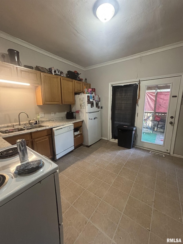 1112 Ophia St, Metropolis, IL 62960 - kitchen with white appliances, ornamental molding, light countertops, a textured ceiling, and brown cabinetry