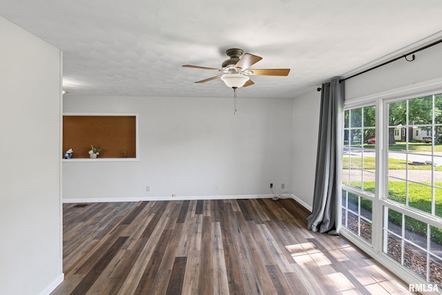 326 N Indiana St, Salem, IL 62881 - spare room featuring a ceiling fan and wood finished floors