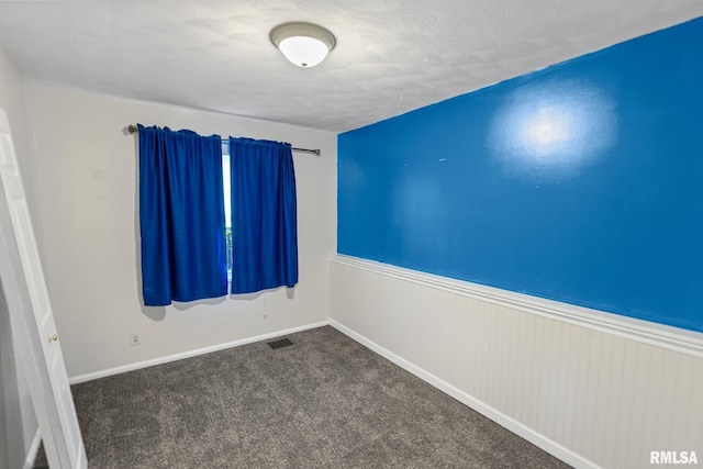 326 N Indiana St, Salem, IL 62881 - carpeted empty room featuring wainscoting and baseboards