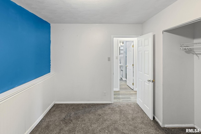 326 N Indiana St, Salem, IL 62881 - unfurnished bedroom featuring carpet flooring and a closet