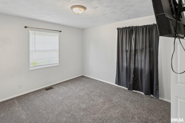 326 N Indiana St, Salem, IL 62881 - carpeted spare room featuring baseboards