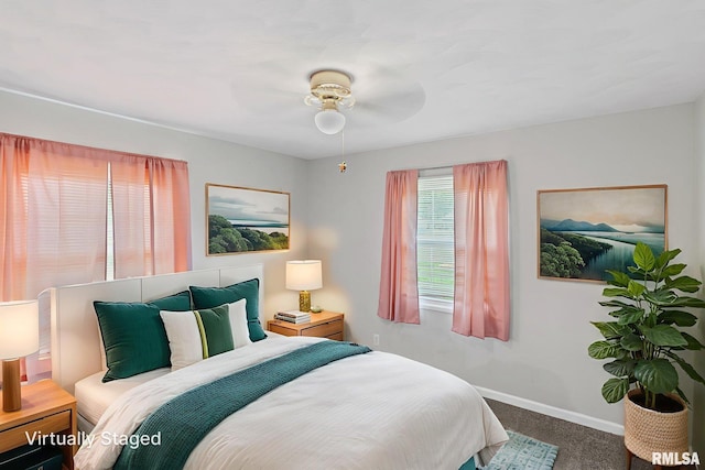 326 N Indiana St, Salem, IL 62881 - carpeted bedroom with baseboards and ceiling fan