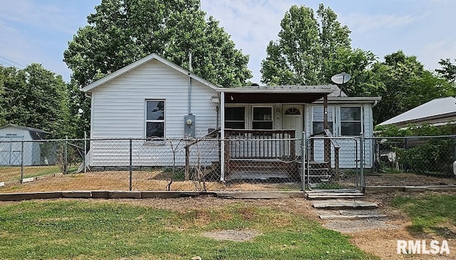 2130 Rains St, Murphysboro, IL 62966 - view of front of property with a fenced front yard, covered porch, and a gate