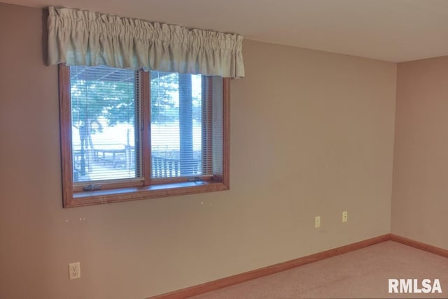 12299 Pebble Point Rd, Marion, IL 62959 - empty room featuring healthy amount of natural light and light carpet