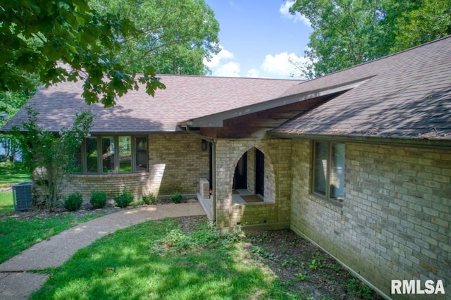 12299 Pebble Point Rd, Marion, IL 62959 - entrance to property with roof with shingles and brick siding