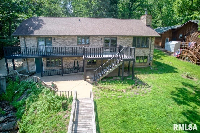 12299 Pebble Point Rd, Marion, IL 62959 - view of front facade featuring stairway, a deck, and a patio area