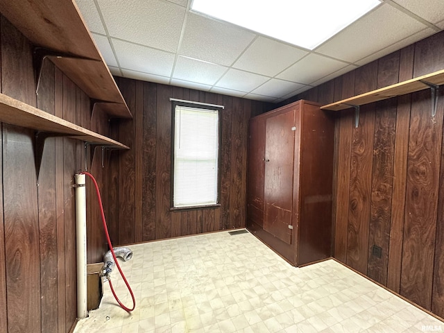 1520 Gartside St, Murphysboro, IL 62966 - unfurnished office with wooden walls, tile patterned floors, and a drop ceiling