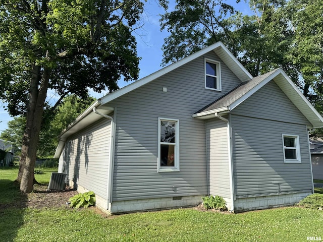 1420 W Cherry St, Herrin, IL 61948 - view of home's exterior with a lawn and a central air condition unit