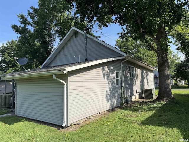 1420 W Cherry St, Herrin, IL 61948 - view of home's exterior with a yard and a cooling unit