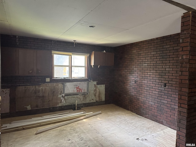1420 W Cherry St, Herrin, IL 61948 - kitchen with brick wall