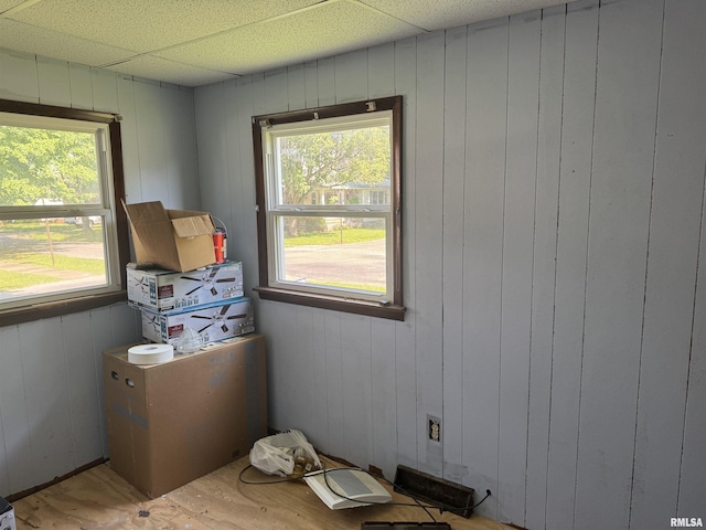 1420 W Cherry St, Herrin, IL 61948 - interior space with healthy amount of natural light, wood finished floors, and wood walls