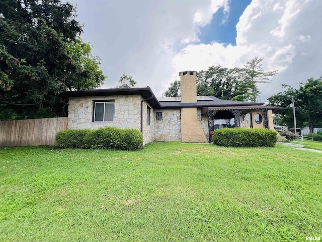 385 3rd St, Omaha, IL 62871 - view of front of property featuring stone siding and a chimney