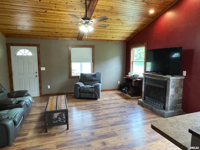339 Spring St, Dongola, IL 62926 - living room with vaulted ceiling, wood ceiling, a ceiling fan, a fireplace, and wood finished floors