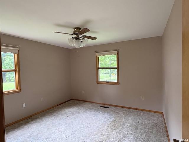 822 N 24th St, Murphysboro, IL 62966 - empty room featuring a ceiling fan and carpet floors