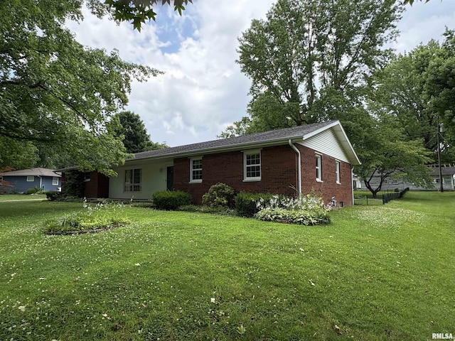 822 N 24th St, Murphysboro, IL 62966 - ranch-style home featuring brick siding and a front yard