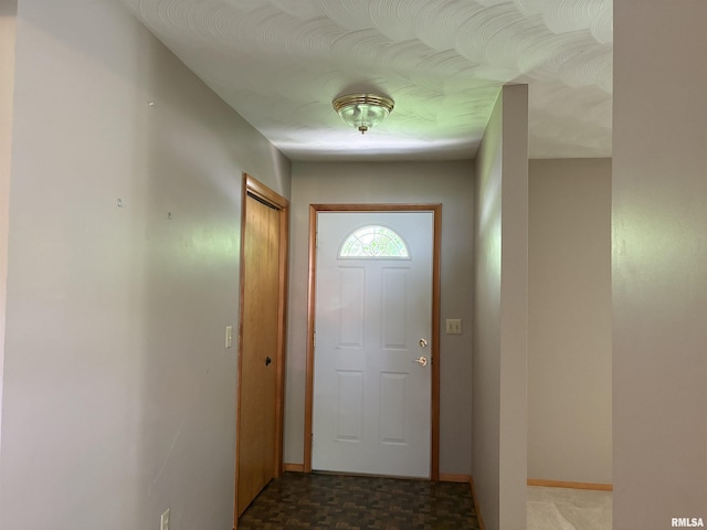 822 N 24th St, Murphysboro, IL 62966 - doorway to outside featuring baseboards