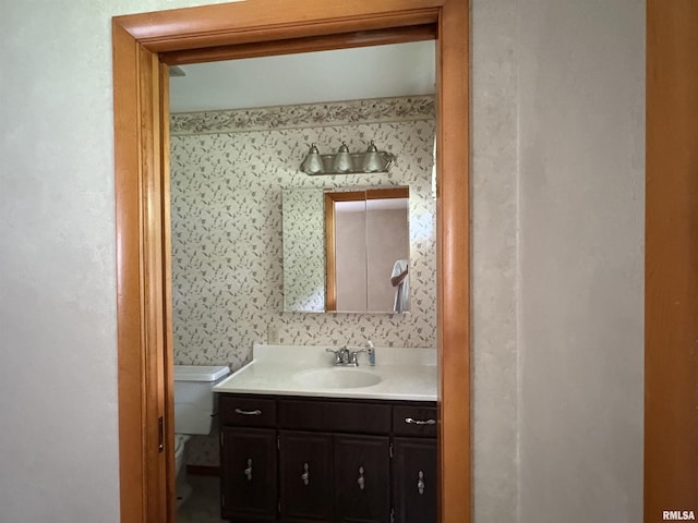 822 N 24th St, Murphysboro, IL 62966 - bathroom featuring vanity and wallpapered walls