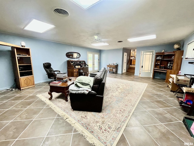 850 Joppa N Ave, Joppa, IL 62953 - living area with tile patterned floors, a desk, and a ceiling fan